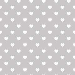 Seamless pattern with white hearts on a grey isolated background. Geometric print. Great for fabric, wallpaper, textile, wrapping. Vector illustration.