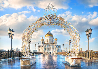 Cathedral of Christ the Savior and lanterns on the Patriarch Bridge to Moscow on a winter day