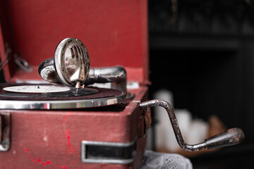 Head with an retro old vintage style gramophone needle on the vinyl disc closeup © Iryna