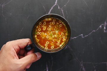 instant cup soup in a mug on table 