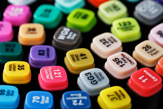 Professional markers for sketching close-ups of different colors.