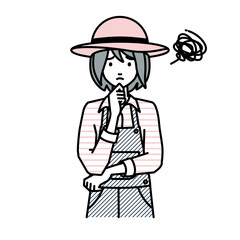 立って手をあごにあてて困っている農家の女性