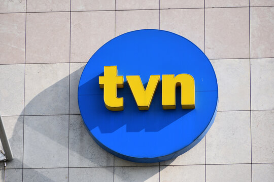 TVN Polish TV channel logo, signage, emblem on the facade of the Polish TV station, owned by TVN Group. WARSAW, POLAND - AUGUST 21, 2021