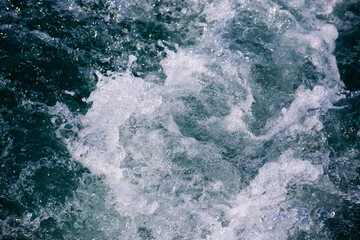 White crest of a sea wave. Selective focus. Shallow depth of field.