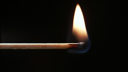 Slow motion photo of the burning match