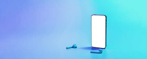 Smartphone screen. Mobile smart phone technology blank screen. Mock up smart phone device, audio headphones equipment on neon gradient background. For text message, information content, clipping path.