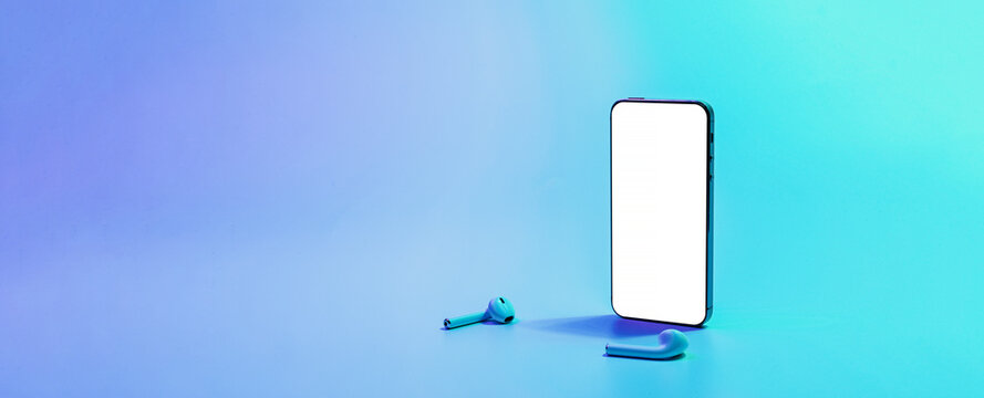 Smartphone screen. Mobile smart phone technology blank screen. Mock up smart phone device, audio headphones equipment on neon gradient background. For text message, information content, clipping path.