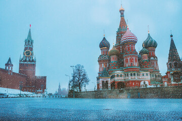 Fototapeta premium Saint Basil`s cathedral, Spasskaya tower and red square in Moscow. Winter morning in the historical centre of Moscow, Russia