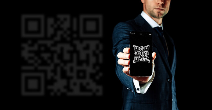 Scan qrcode. Digital mobile smart phone with qr code scanner on smartphone screen for payment, online pay, scan barcode technology man holding. Retail shop accepted digital pay without money.