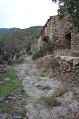 Abandoned mountain village houses. Ghost village. Old stone houses in abandoned village
