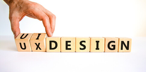UX user experience design or UI user interface design symbol. Businessman turns cubes, changes...