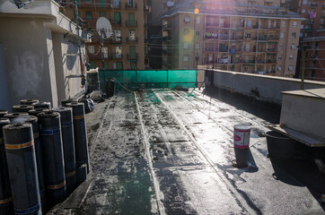 laying of waterproofing sheathing  and insulation during the renovation of a roof in Italy - 477009902