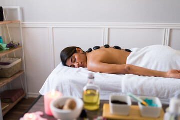 Obraz na płótnie Canvas Gorgeous woman enjoying a spa treatment