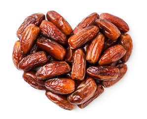 Dates fruit in the shape of a heart on a white background, isolated. Top view