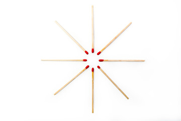 Matchsticks radially spaced on a white background. Different angle matchstick photography, 

matchstick placed like a sun. Isolated on white with clipping path