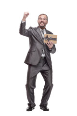 happy business man with a gift box. isolated on a white background.