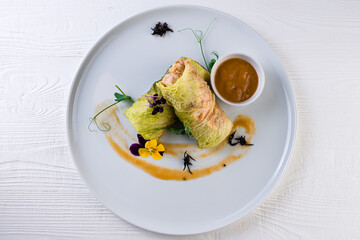 savoy cabbage rolls stuffed with meat and vegetables top view, flat lay