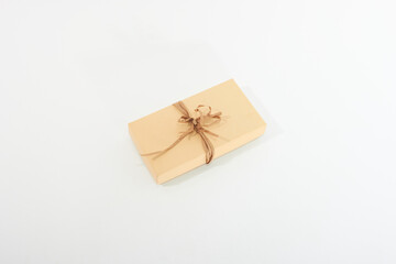 Gift box, top view yellow gift box isolated on white background.