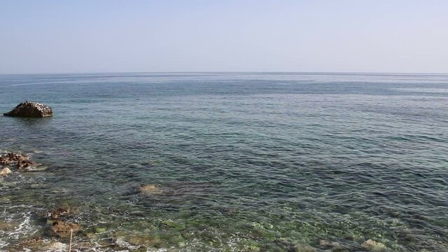 Emerald sea waves. Adriatic Sea. Summer breeze and relaxation