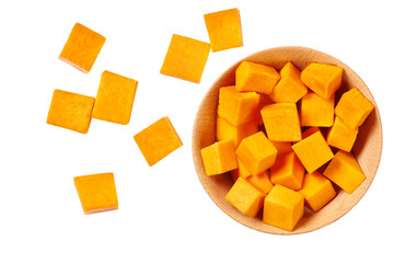 Diced butternut squash in a wooden bowl  isolated on a white background.