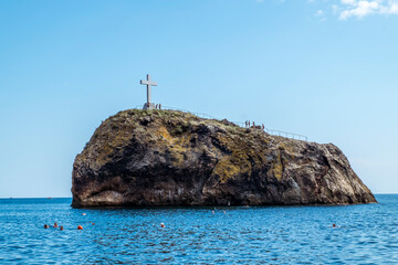 Fototapeta na wymiar Beautiful view of St. George's rock with a cross on Cape Fiolent on the Crimean peninsula.