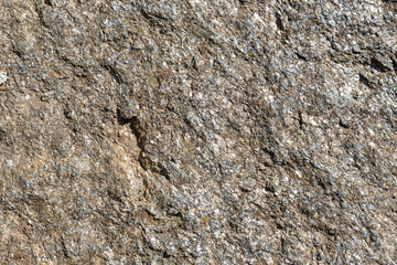 Grey stone background with white and ochre colours