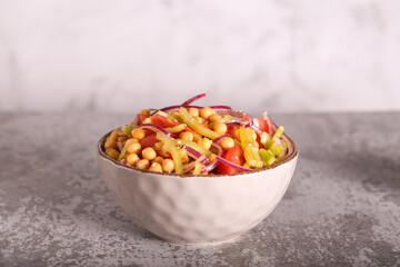 salad with chickpeas and vegetables is on the table