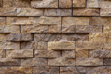 Background of exterior bricks with relief in beige color