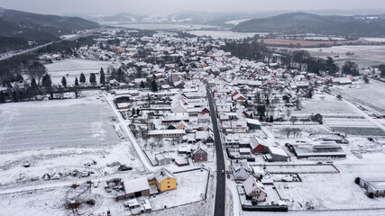 Fototapeta na wymiar The village of Herleshausen in the Wintertime