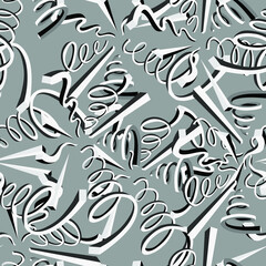 seamless abstract pattern in gray tones of randomly arranged volumetric figures of a fancy shape for prints on fabric, wallpaper, clothing and for background decoration