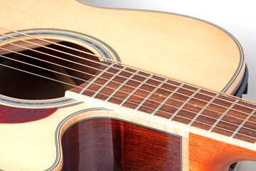 Obraz premium new acoustic guitar close up
