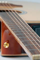 Obraz premium new acoustic guitar close up