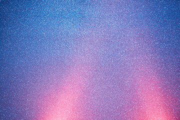 Grainy blue background with two short pink beams of light
