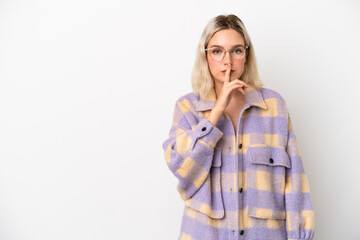 Young caucasian woman isolated on white background showing a sign of silence gesture putting finger...