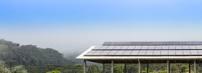 Rural landscape and roof with solar panels.