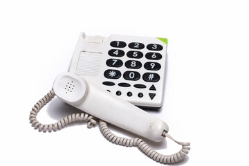 landline phone with large buttons white background