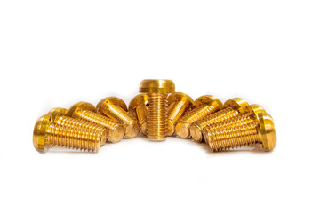 Bronze screws made on a lathe on a white isolated background.