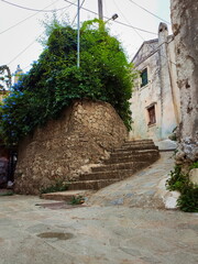 Malownicze schody i stare budynki w Agii Deka - obrazy, fototapety, plakaty