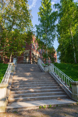 Stairs to an old building at the Hatanpää arboretum public park in Tampere, Finland, on a sunny...