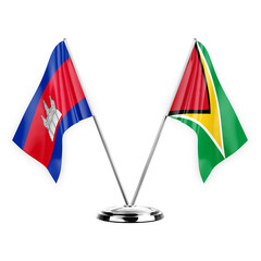 Two table flags isolated on white background 3d illustration, cambodia and guyana