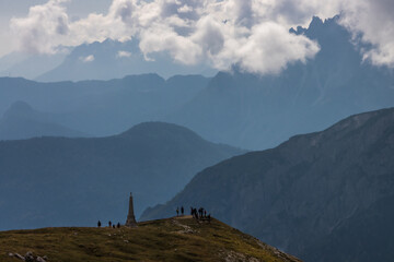 clouds over mountain trail Tre Cime di Lavaredo in Dolomites in Italy