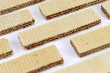 Fototapeta na wymiar Pattern of waffle biscuit on a white background