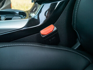 Obraz na płótnie Canvas seat belt buckle in a modern car. close-up. road safety