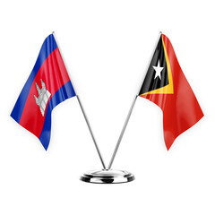 Two table flags isolated on white background 3d illustration, cambodia and timor leste