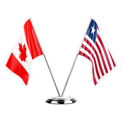 Two table flags isolated on white background 3d illustration, canada and liberia