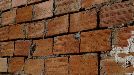 rustic red brick wall as background