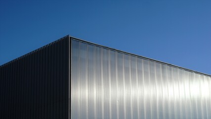Fototapeta na wymiar facade of modern building against sky