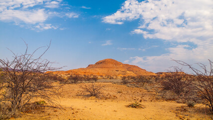 Fototapeta na wymiar Orange rock formation in Damaraland