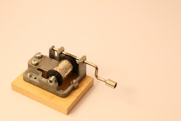 Old style musical toy. Close up and isolated on a white background. Copy space for extra text. 