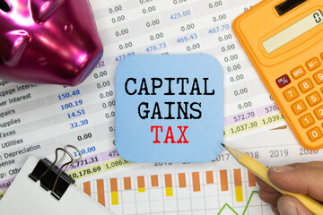 Capital gains tax-text label in the form of a document Registrar planning folder.